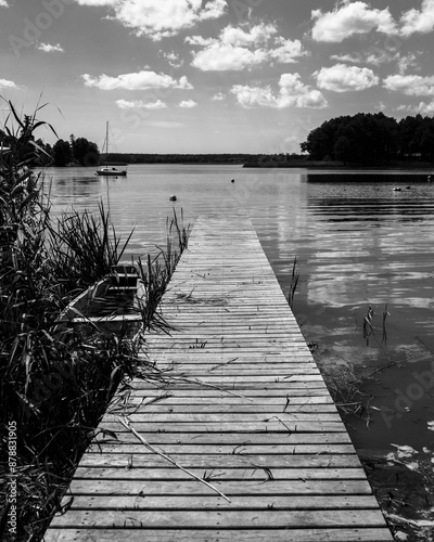 Pomost na plaży w słoneczny dzień Jezioro Lubie Zachodniopomorskie photo