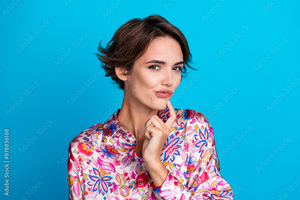 Photo of elegant minded girl wear trendy clothes hand touch face hmm dilemma doubt isolated on blue color background Photo of elegant minded girl wear trendy clothes hand touch face hmm dilemma doubt isolated on blue color background