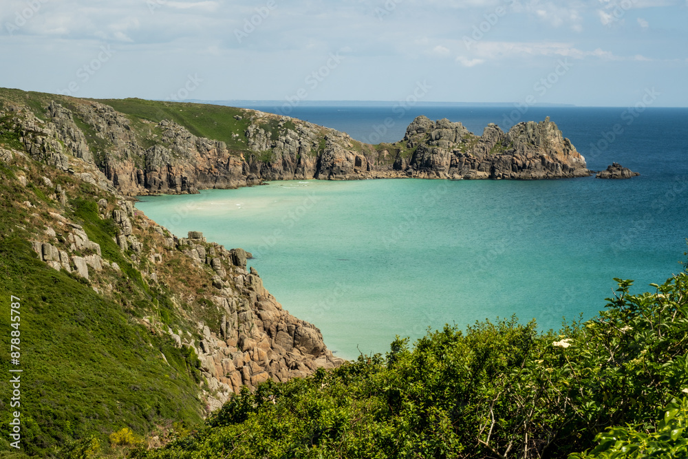 Porthcurno Beach is tucked away on the south coast of the Penwith peninsula in Cornwall, with crystal clear water and golden sand spanning the beach. It is simply stunning. Porthcurno Beach is tucked away on the south coast of the Penwith peninsula in Cornwall, with crystal clear water and golden sand spanning the beach. It is simply stunning.