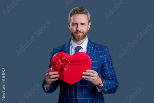 Corporate present reward. Mens day. Successful boss share gift box. Businessman prepare for Valentines day. Business reward. Business man with corporate gift box isolated on grey