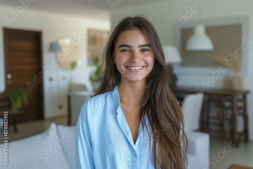 Smiling young woman relaxing at home, casual concept Free Download Smiling young woman relaxing at home, casual concept - GFXLoad