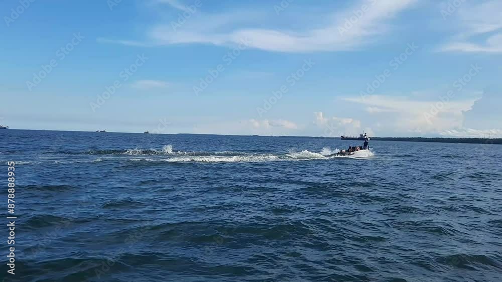 speedboat carrying passengers across the ocean speedboat carrying passengers across the ocean