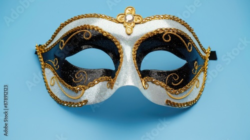 Golden Glitter Black and White Masquerade Mask on Blue Background