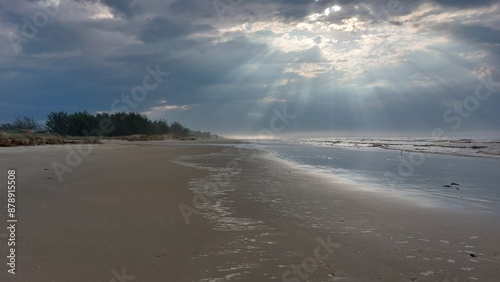 Stormy sky over the  Sea. The sun's rays make their way through the clouds.