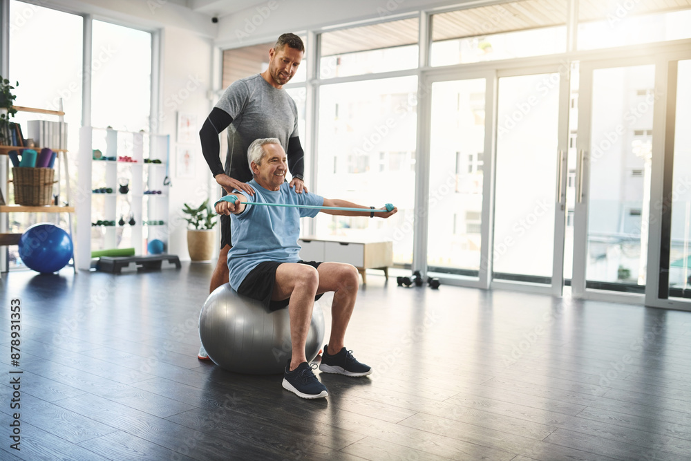 Stretching, senior man and physiotherapist with band for resistance training, support or muscle workout. Fitness, physiotherapy and elderly person with gym ball, mobility exercise and retirement Stretching, senior man and physiotherapist with band for resistance training, support or muscle workout. Fitness, physiotherapy and elderly person with gym ball, mobility exercise and retirement