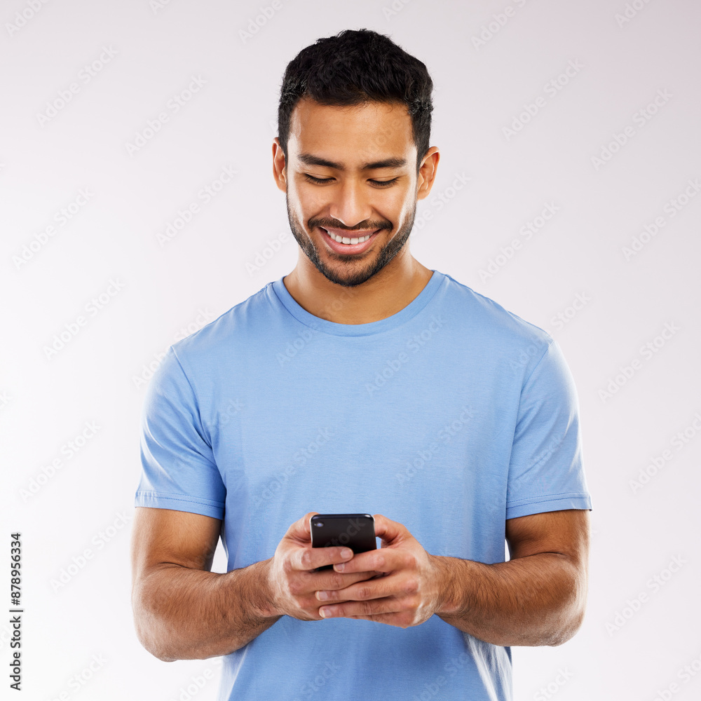 Asian man, studio and happy with smartphone on email or communication on white background. Isolated, online and smile or satisfied on website with mobile or notification and text for loan approval Asian man, studio and happy with smartphone on email or communication on white background. Isolated, online and smile or satisfied on website with mobile or notification and text for loan approval