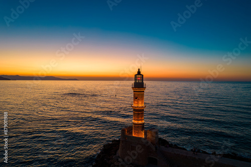 Aerial view  of the iconic old  lighthouse of  chania, Crete, Greece during sunset