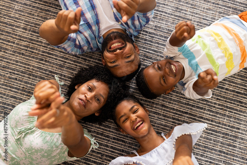 Diverse family enjoys a playful moment at home