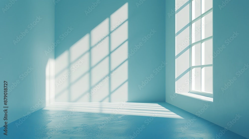A minimalist and simple abstract light blue background for product presentation can be achieved by capturing the interplay of shadow and light from windows on a wall.
