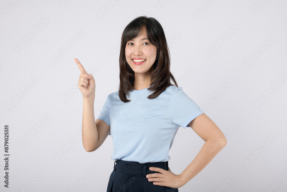 Pointing finger. young Asian woman pointing up to copy space and looking at camera with smile face and happy. Pretty girl act like satisfied product, use for advertising with isolated on white. Pointing finger. young Asian woman pointing up to copy space and looking at camera with smile face and happy. Pretty girl act like satisfied product, use for advertising with isolated on white.