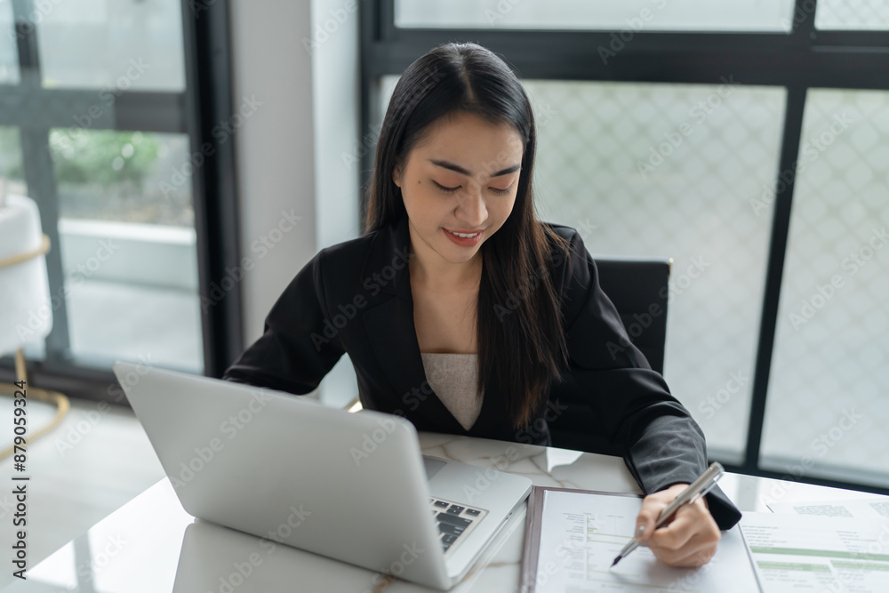 Beautiful Business Woman working by using laptop computer Hands typing on keyboard. Professional investor working new start up project. business planning in office. Technology business Concept Beautiful Business Woman working by using laptop computer Hands typing on keyboard. Professional investor working new start up project. business planning in office. Technology business Concept