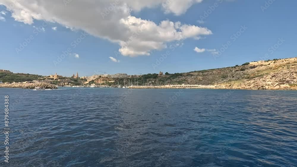 Riding on a boat and overlooking the coastline of Malta on a sunny day. Captures the essence of maritime exploration and the scenic beauty of the Mediterranean. Riding on a boat and overlooking the coastline of Malta on a sunny day. Captures the essence of maritime exploration and the scenic beauty of the Mediterranean.