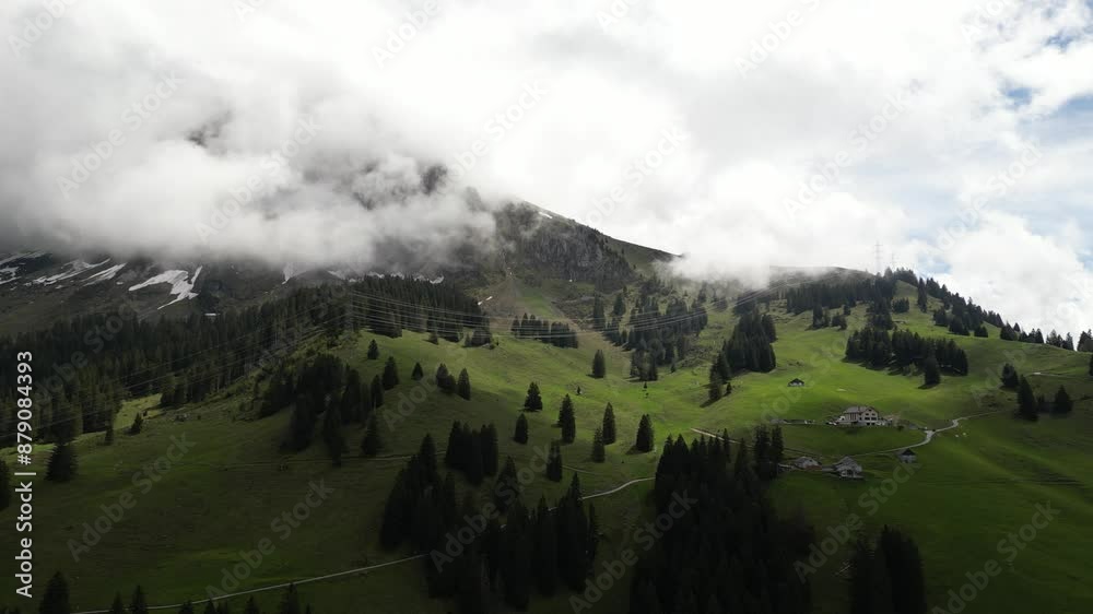 Fronalpstock Glarus Switzerland aerial beautiful green valley just under the clouds Fronalpstock Glarus Switzerland aerial beautiful green valley just under the clouds