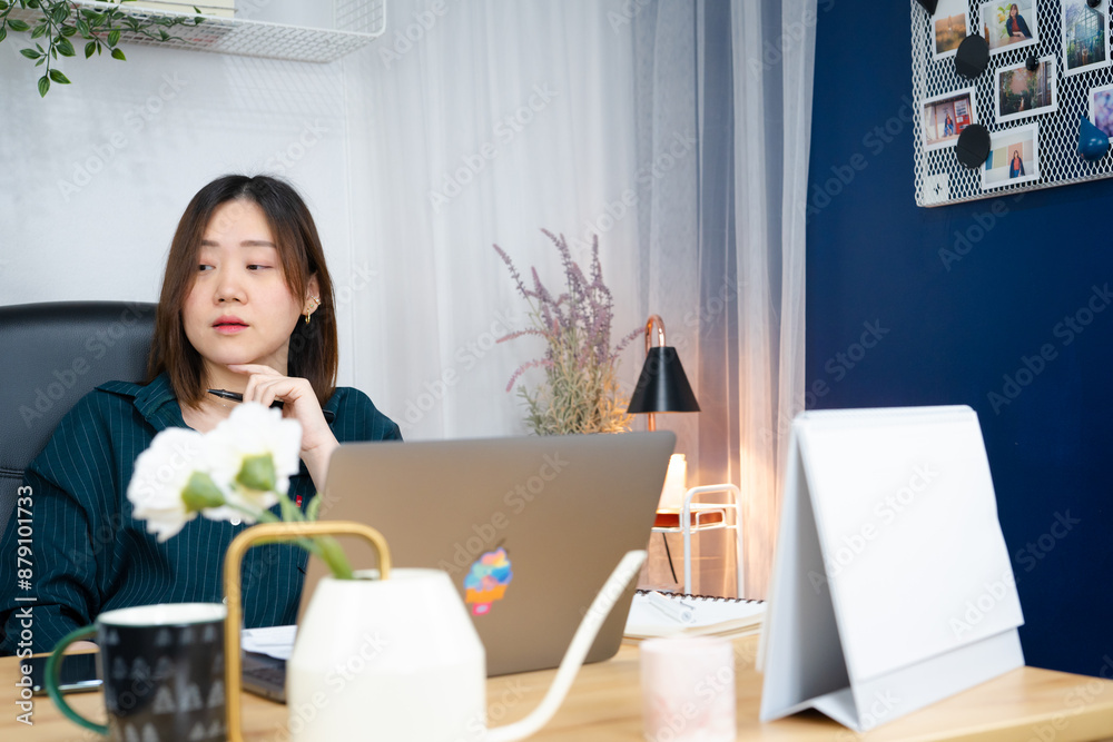 asian woman use laptop for working her business from home asian woman use laptop for working her business from home