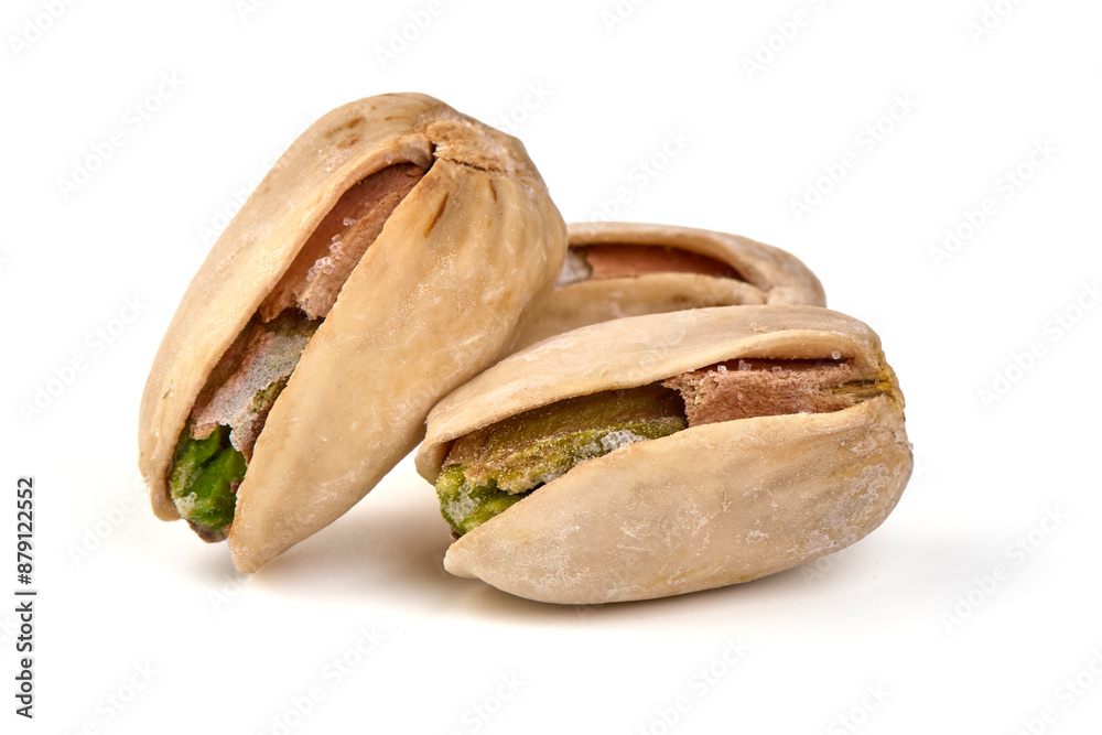 Pistachio nuts, isolated on white background. High resolution image. Pistachio nuts, isolated on white background. High resolution image.