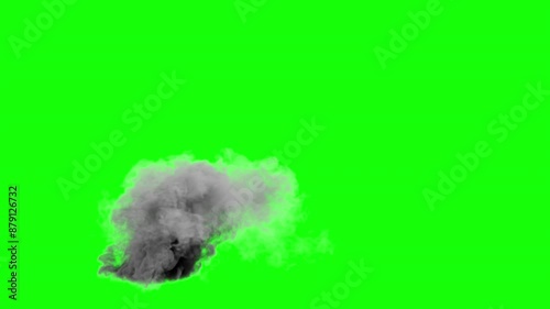 smoke rising from the ground on a green background. pollution smoke on green background. visual effect of smoke coming from a manhole. gray smoke exaust from the ground photo