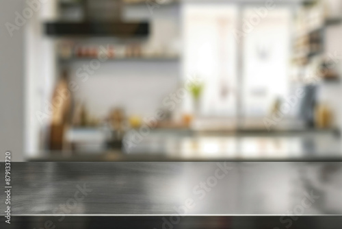 Empty metallic surface for product display with blurred kitchen background