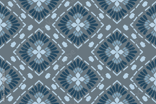 Embroidered Ikat flower pattern on a black background. Traditional ethnic ikat, Aztec abstract vector pattern, seamless pattern in tribal, folk embroidery and Mexican style.