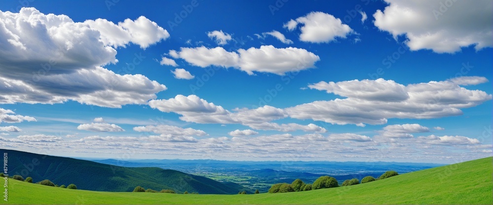 Fototapeta premium wonderful mountain landscape with green and blue cloudy sky