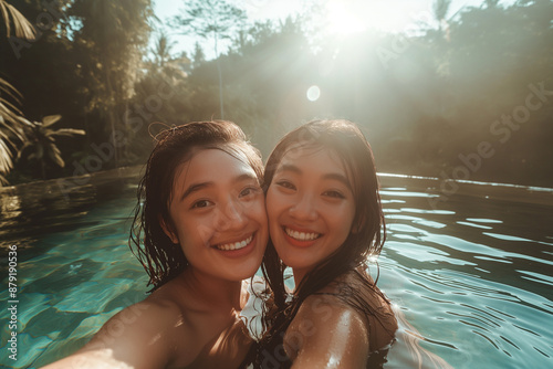 two happy women in the pool