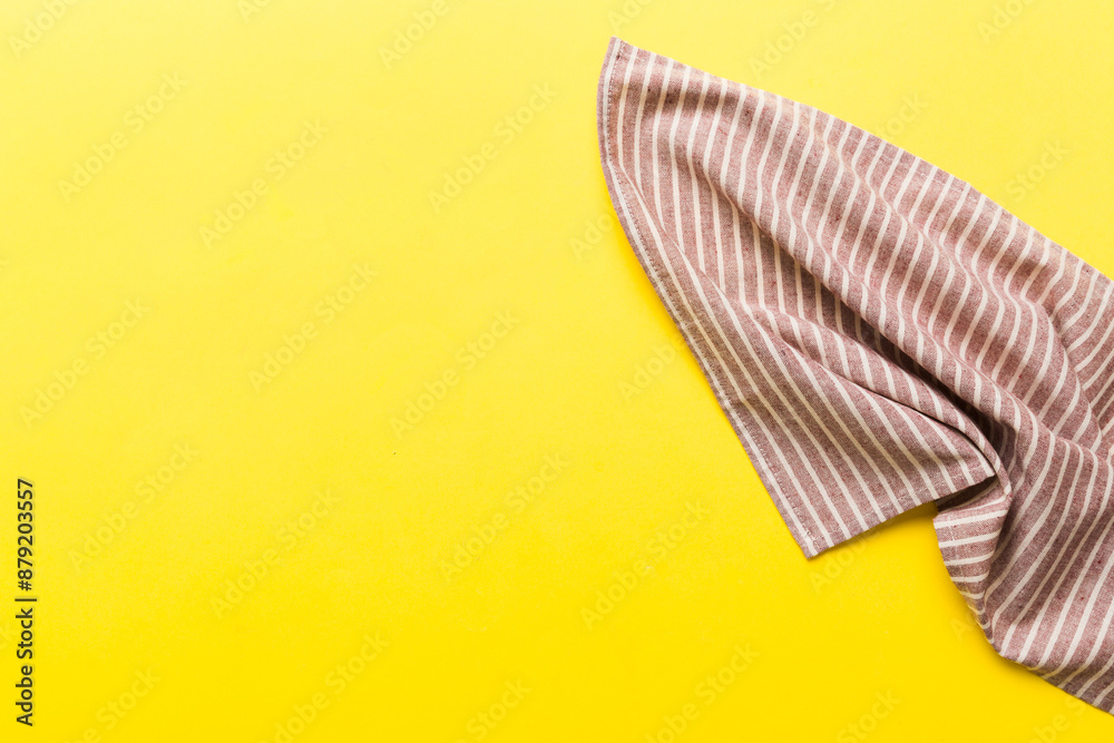 top view with red empty kitchen napkin isolated on table background. Folded cloth for mockup with copy space, Flat lay. Minimal style top view with red empty kitchen napkin isolated on table background. Folded cloth for mockup with copy space, Flat lay. Minimal style