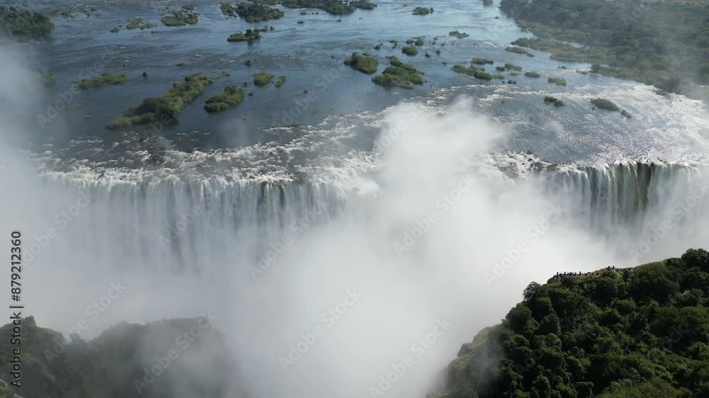 Aerial Drone View of Victoria Falls and the Rainbows, In Between Zambia and Zimbabwe Aerial Drone View of Victoria Falls and the Rainbows, In Between Zambia and Zimbabwe