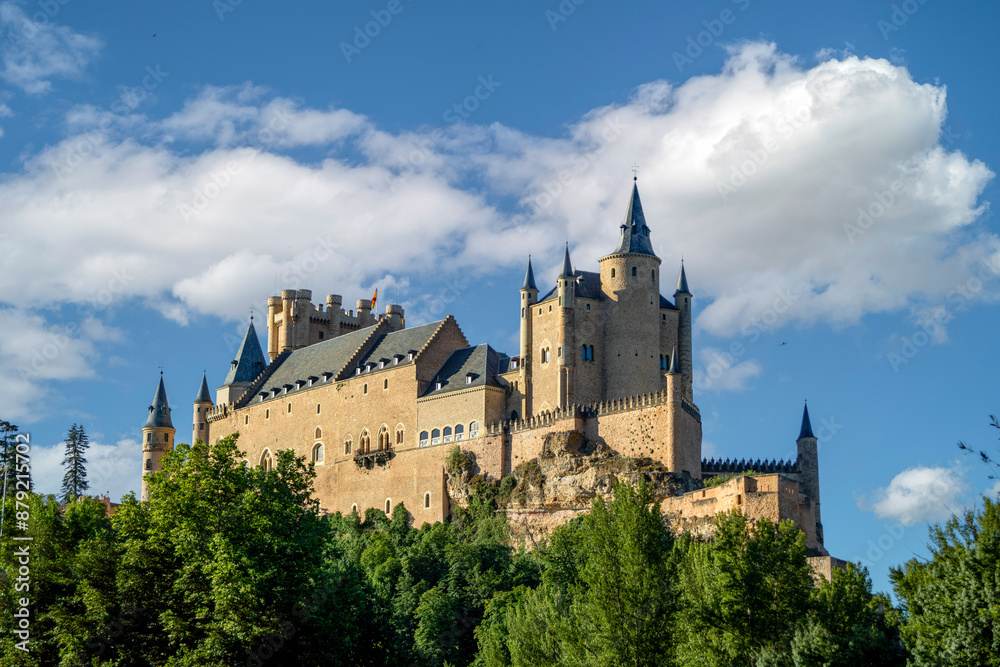 View of the spectacular Alcázar of Segovia from the Eresma river promenade, Segovia, Castilla y Leon, Spain View of the spectacular Alcázar of Segovia from the Eresma river promenade, Segovia, Castilla y Leon, Spain