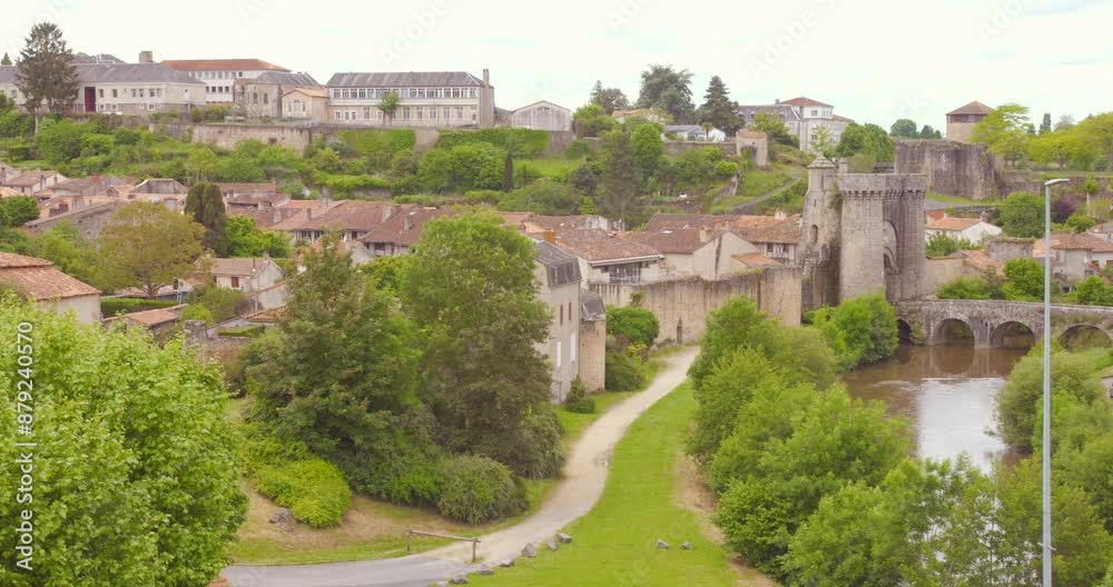Fortified Town With Château de Parthenay Over River Thouet In Western France. Aerial Wide Shot