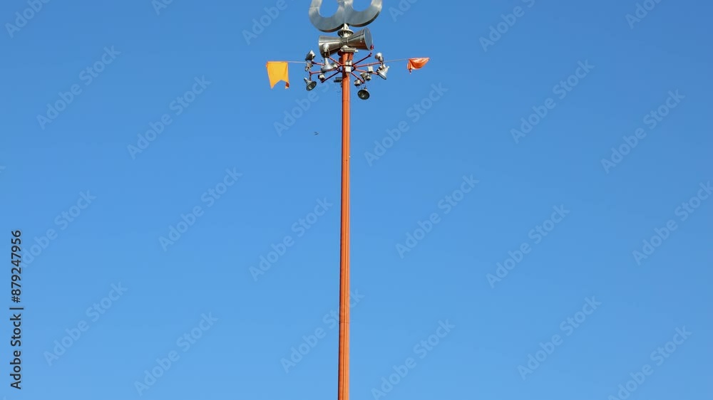 hindu god lord shiva holy trident with bright blue sky at morning video is taken at shipra river ujjain madhya pradesh india. hindu god lord shiva holy trident with bright blue sky at morning video is taken at shipra river ujjain madhya pradesh india.