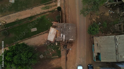 South Brazil Floods 2024 - Upwards Drone shot of dislodged house in the aftermath of floods in Cruzeiro do Sul City - Rio Grande do Sul photo