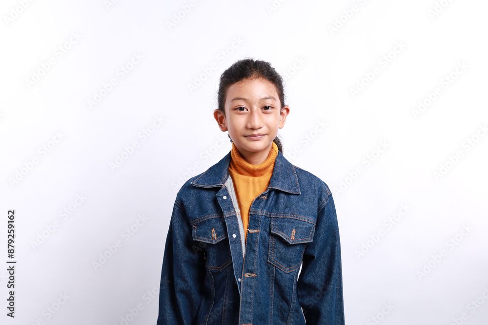 Happy young asian girl in casual outfit standing isolated over white background Happy young asian girl in casual outfit standing isolated over white background