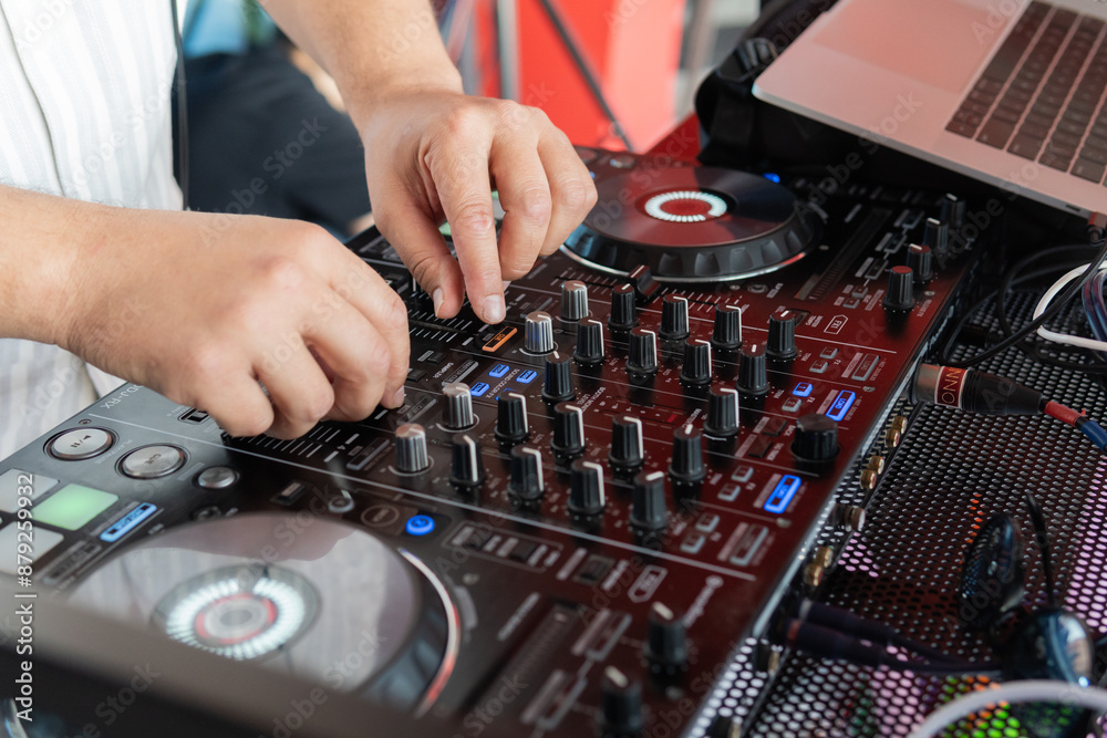 DJ mixing music on professional sound equipment. Electronic concept. DJ mixing music on professional sound equipment. Electronic concept.