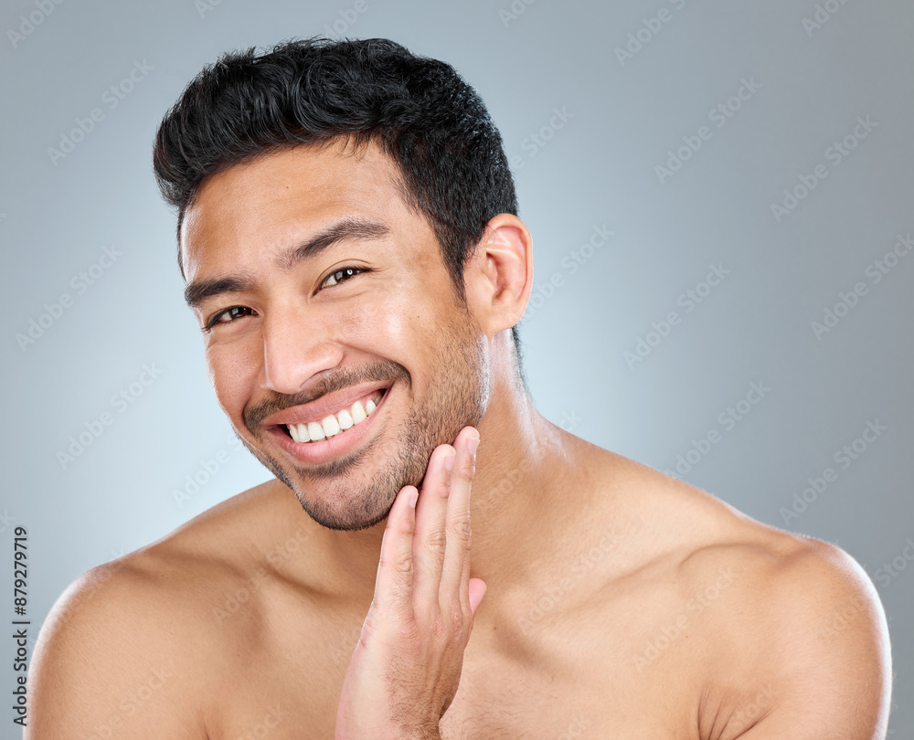 Obraz premium Beauty, portrait and smile of natural man in studio on gray background for cosmetic wellness. Dermatology, grooming and skincare with face of happy person in bathroom for hydration or hygiene