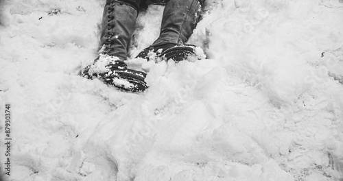 Obraz na płótnie Fallen Soldier Of United States Army Infantry At World War Ii. Close-up View On Army Boots Of Re-enactor Dressed As American Infantry Soldier. Heroes Of War. Military Boots Of Dead Soldier On Snow w salonie