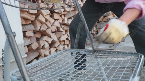 Man painting an object. Panning shot of adult man while working the chair
