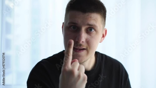 An angry man speaks impulsively.
Emotions of an angry person.
The man is very angry and incensed about something.
Angry and aggressive facial expressions