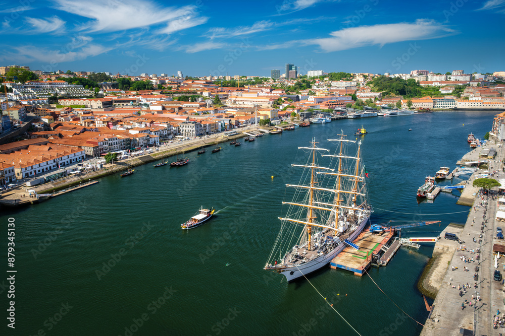 Aerial view of Porto city and Vila Nova de Gaia and Douro river with moored sailling ship from Dom Luis bridge I. Porto, Portugal Aerial view of Porto city and Vila Nova de Gaia and Douro river with moored sailling ship from Dom Luis bridge I. Porto, Portugal