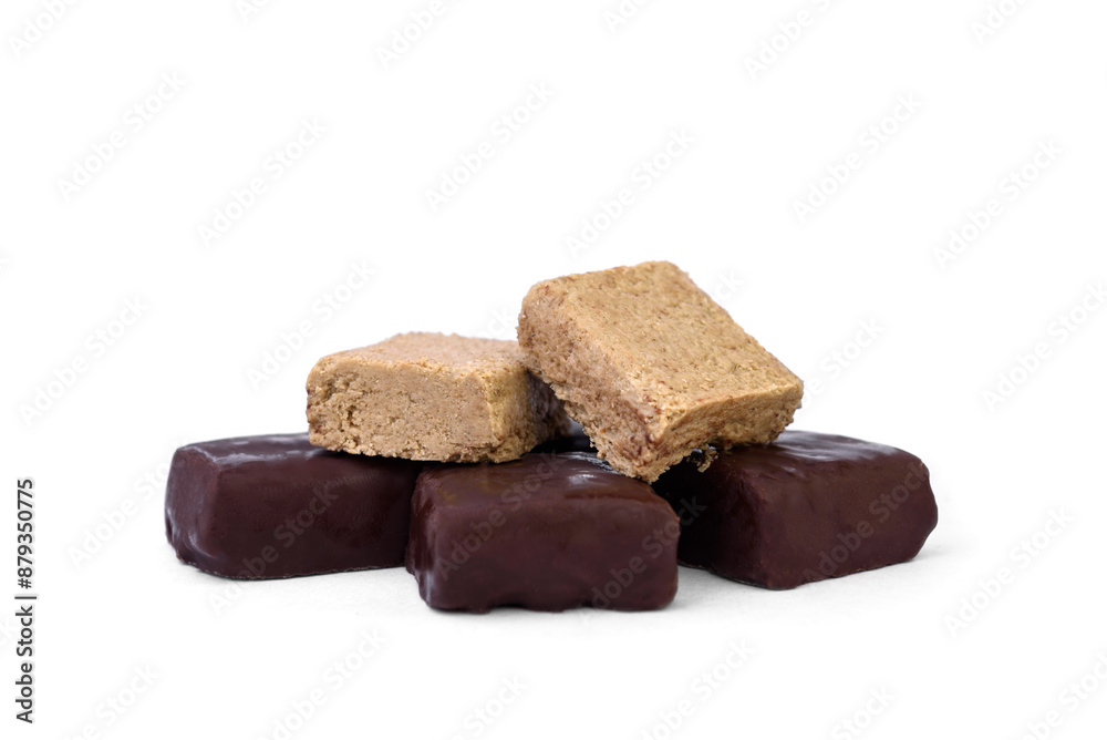 Halva sweets in chocolate isolated on white background. Halva sweets in chocolate isolated on white background.
