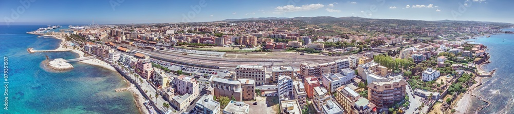 Drone panorama over the Italian city of Civitavecchia with harbor and cruise ships during the day Drone panorama over the Italian city of Civitavecchia with harbor and cruise ships during the day