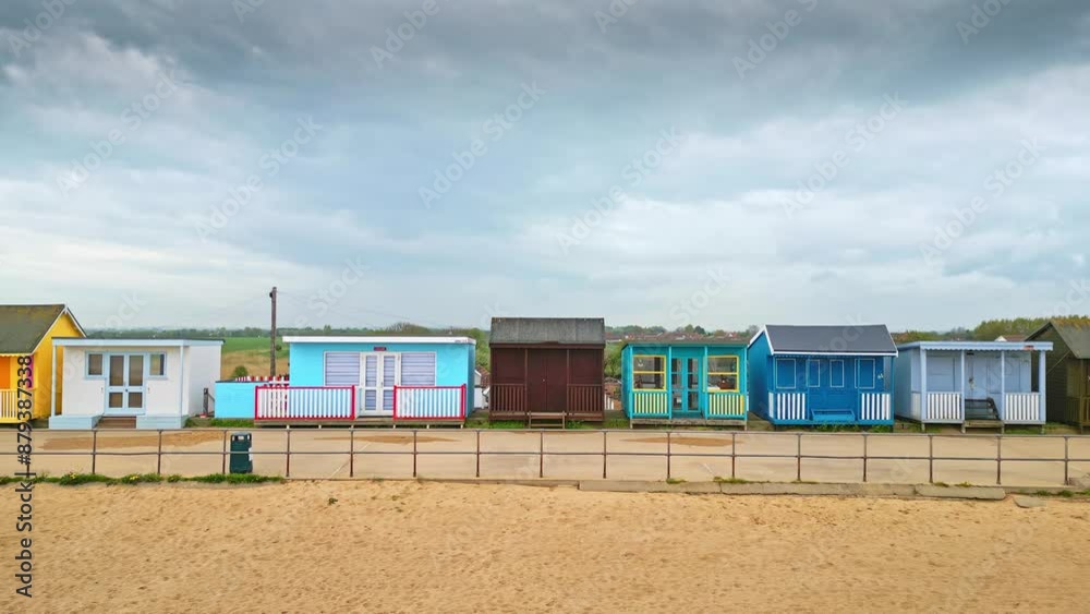 Mablethorpe's coastal beauty captured from the air, showcasing beach huts, sandy shores, and bustling amusement parks. Mablethorpe's coastal beauty captured from the air, showcasing beach huts, sandy shores, and bustling amusement parks.