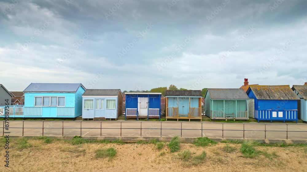 Mablethorpe's coastal beauty captured from the air, showcasing beach huts, sandy shores, and bustling amusement parks. Mablethorpe's coastal beauty captured from the air, showcasing beach huts, sandy shores, and bustling amusement parks.