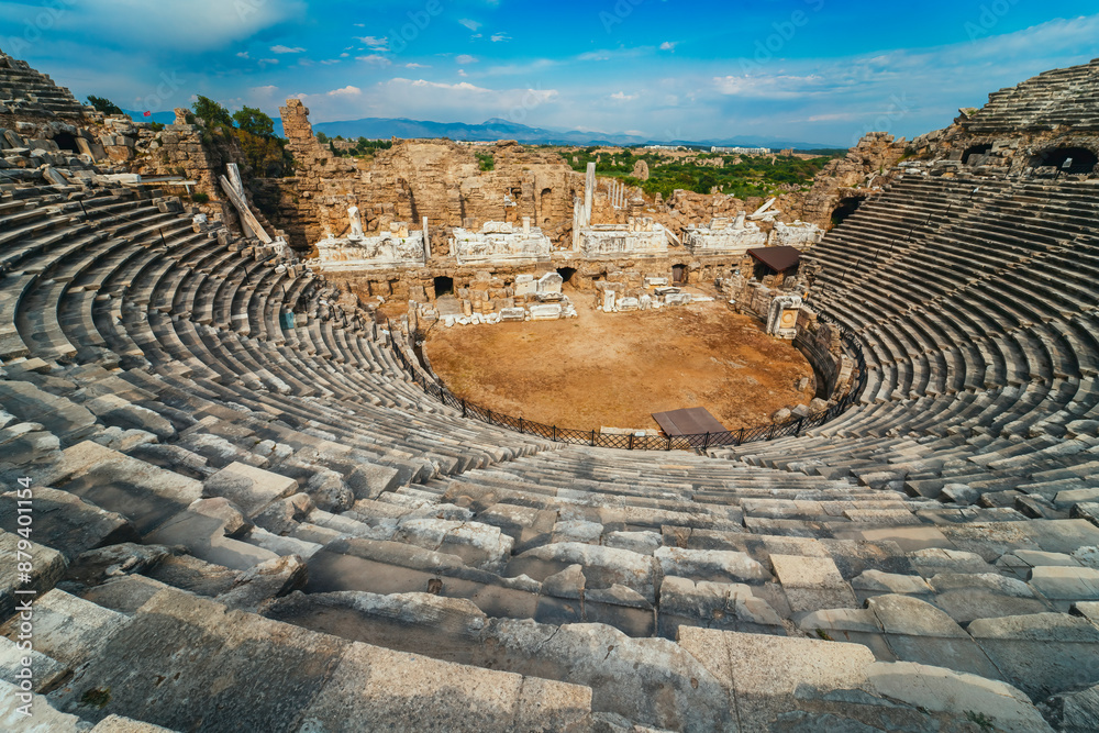 Obraz premium Aspendos, Antalya. Spectacular cloudscape accompanying the panoramic view of the Roman Theater in Turkey.