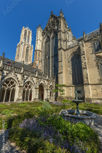 Pandhof of the Dom and garden with tower and church in Utrecht photo