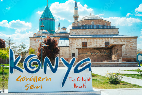 Mevlana Tomb and Mosque in Konya. View of the Mevlana Museum with the Konya inscription in front of it. Mevlana Celaleddin-i Rumi. Konya, Turkey.