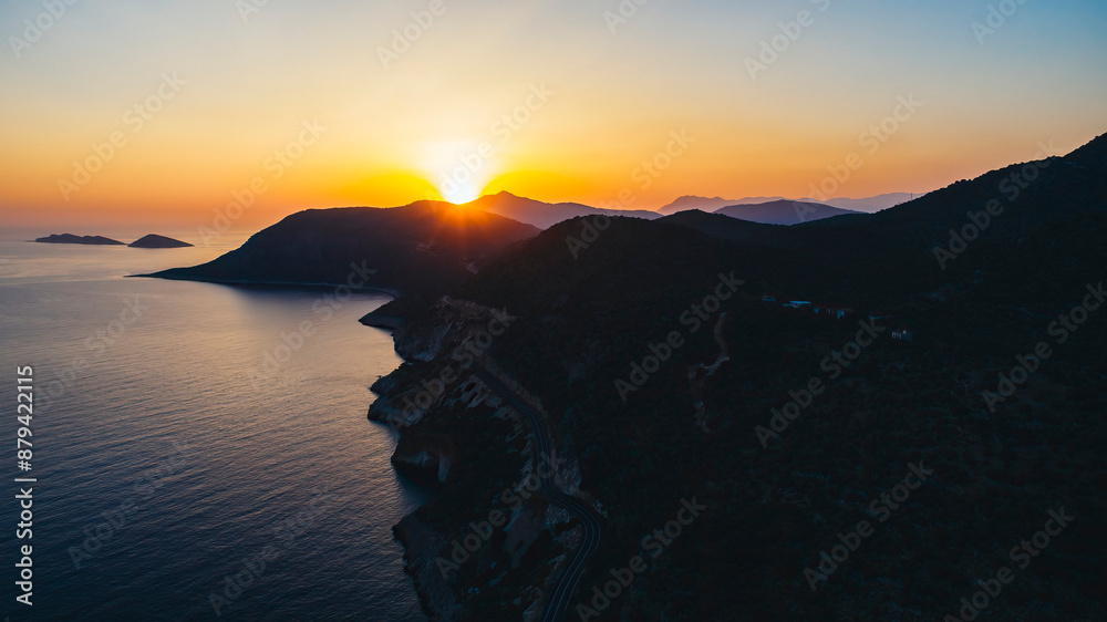 Sunset in Patara, famous for its sand dunes and sea waves. Magnificent photo of the mountain and the sea as the sun sets. Antalya, Turkey. Sunset in Patara, famous for its sand dunes and sea waves. Magnificent photo of the mountain and the sea as the sun sets. Antalya, Turkey.