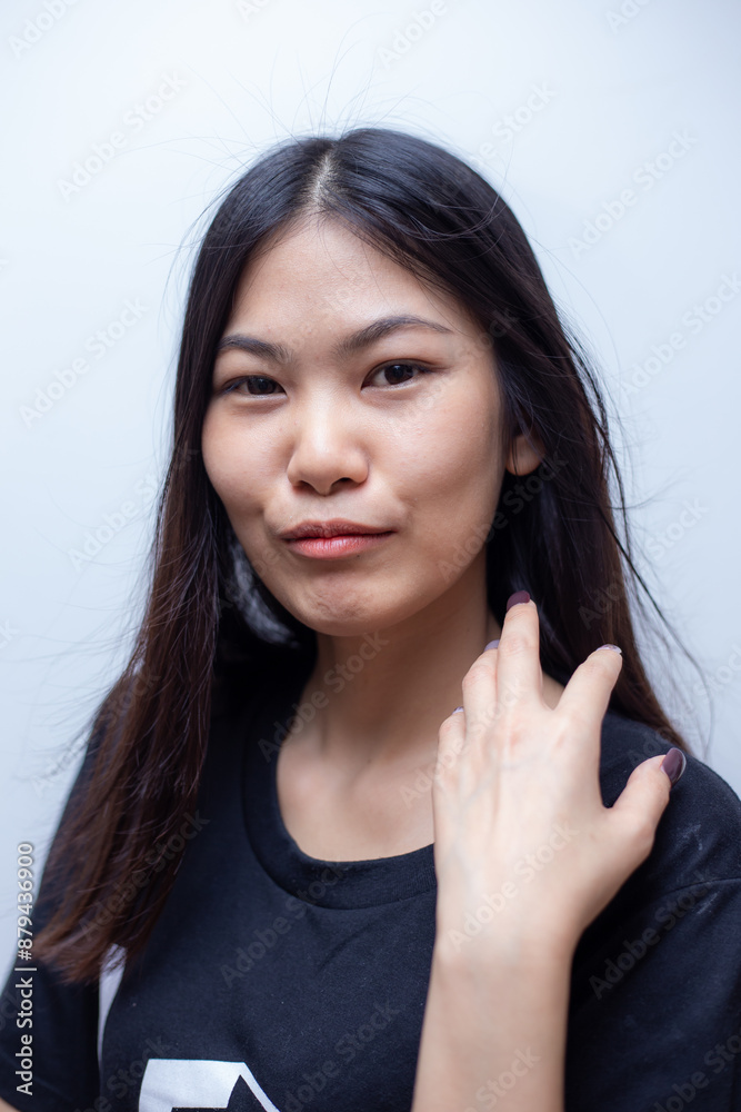 Portrait of smiling laughting asian beautiful long hair woman Portrait of smiling laughting asian beautiful long hair woman