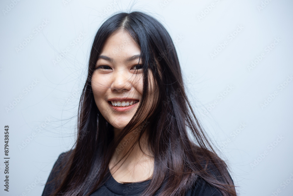Portrait of smiling laughting asian beautiful long hair woman Portrait of smiling laughting asian beautiful long hair woman