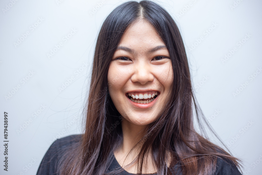 Portrait of smiling laughting asian beautiful long hair woman Portrait of smiling laughting asian beautiful long hair woman