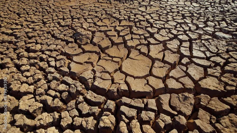 Gimbal shot of dried mud ridges in the kenyan savanna during the evening