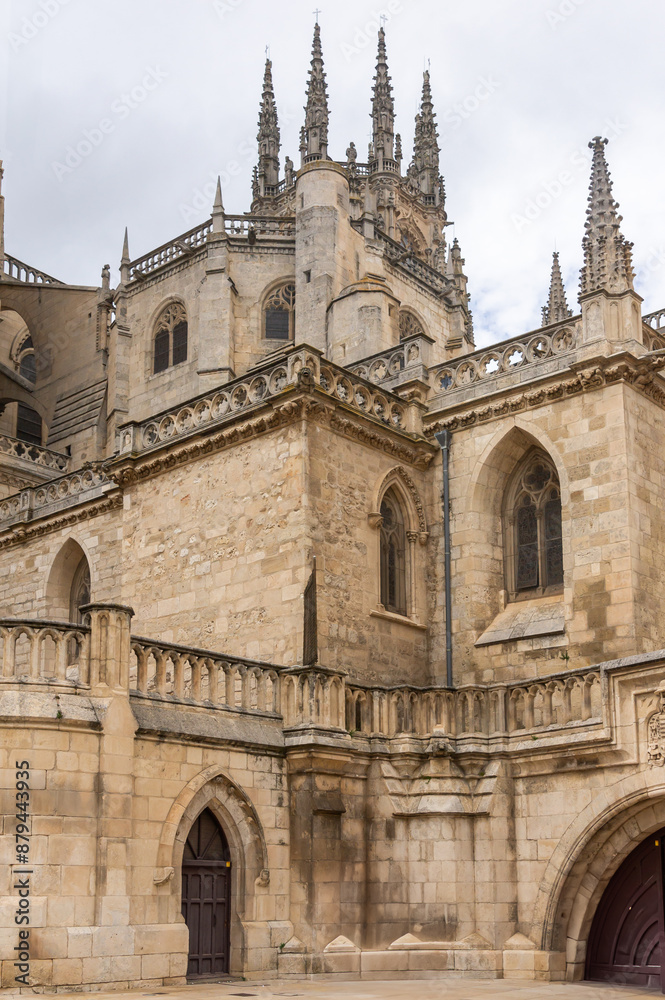 Vertical contrasts: tiered walls with windows and spires of Burgos Gothic Cathedral. Vertical contrasts: tiered walls with windows and spires of Burgos Gothic Cathedral.